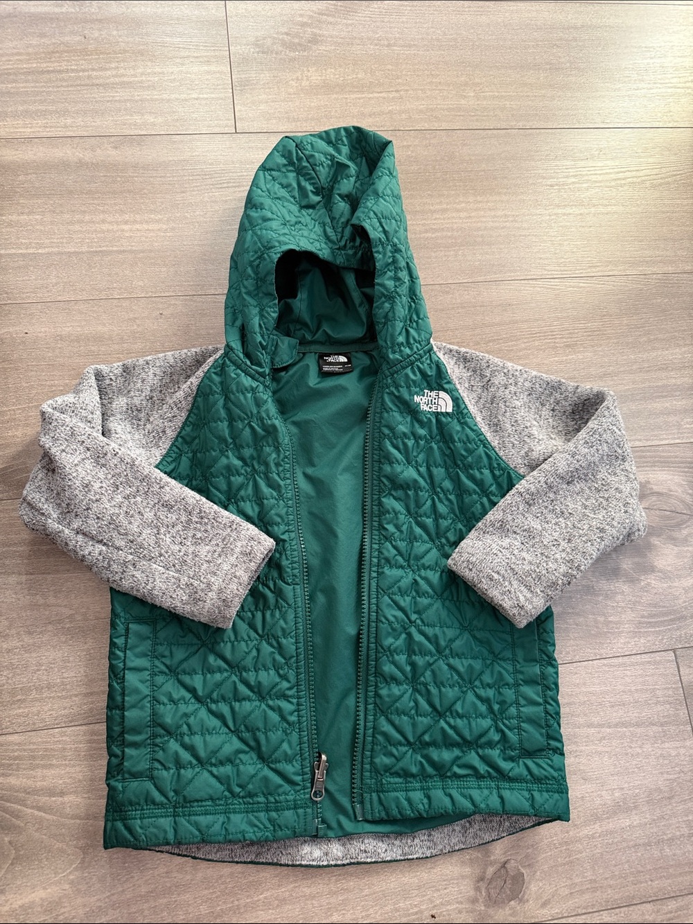 The North Face Green Quilted Hooded Jacket with Gray Sleeves